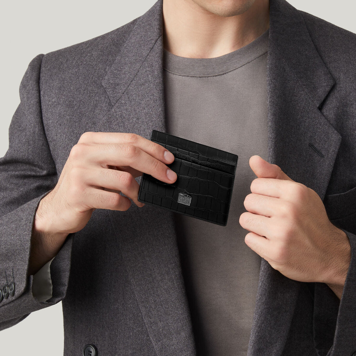 Portacarte Giovanni Raspini in pelle croco nera
