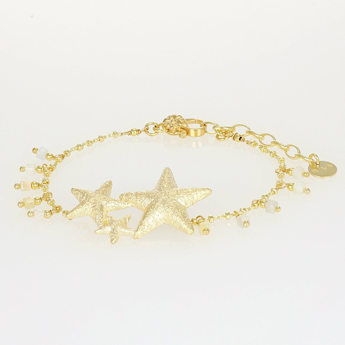 Bracciale Sahra NIVY con stelle diamantate e cubi di acquamarina