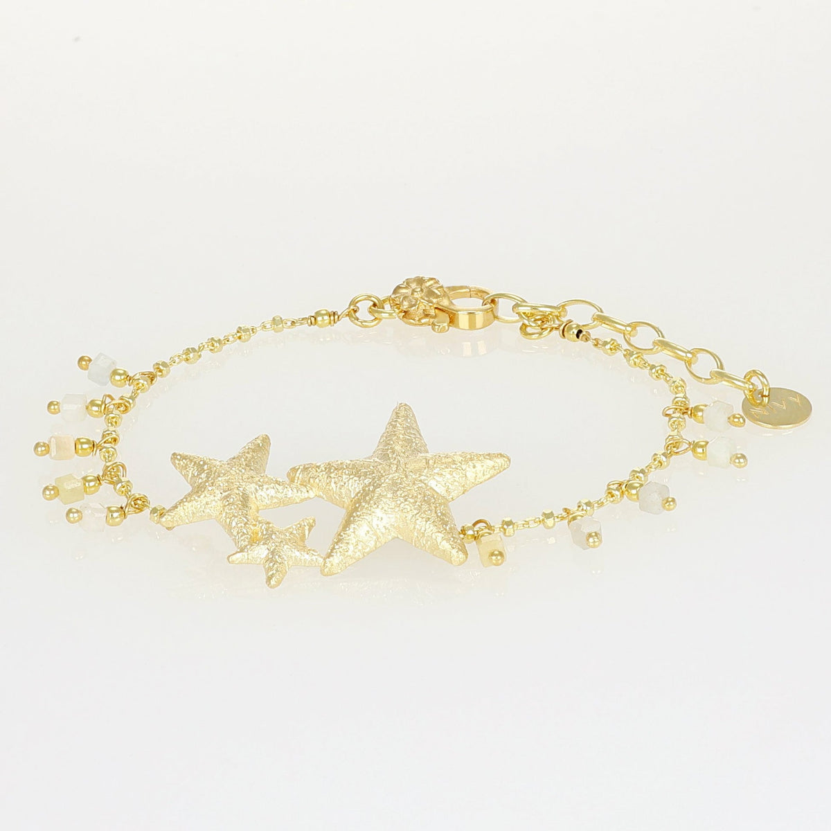 Bracciale Sahra NIVY con stelle diamantate e cubi di acquamarina