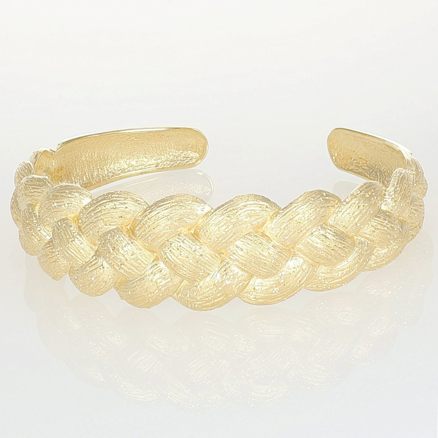 Bracciale manetta Noely NIVY dorato con treccia diamantata